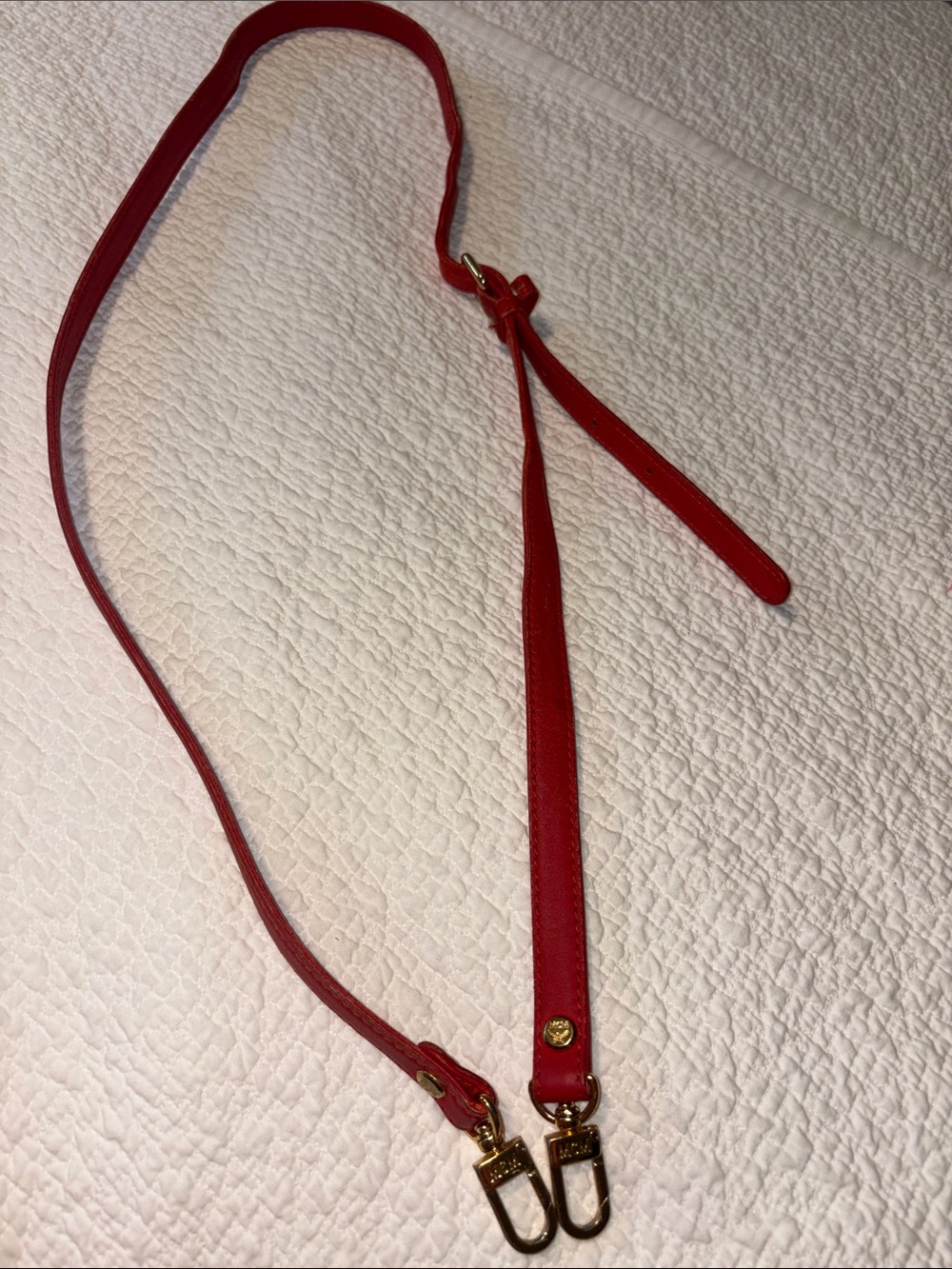 MCM Red Leather Adjustable Crossbody Strap with Gold Hardware.